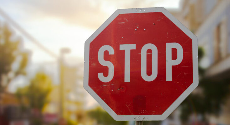 stop-sign-city-while-dawn