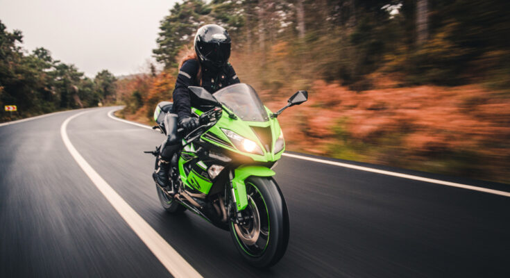 Driving Green Neon Color Motorcycle Road