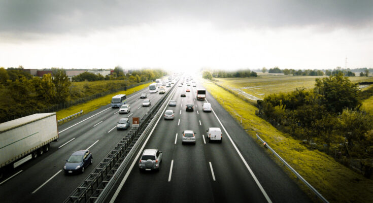 Cars Traveling Highway